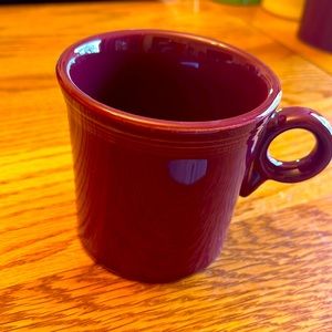 Fiestaware mug- burgundy. Good condition. Minor marks on rim and bottom.